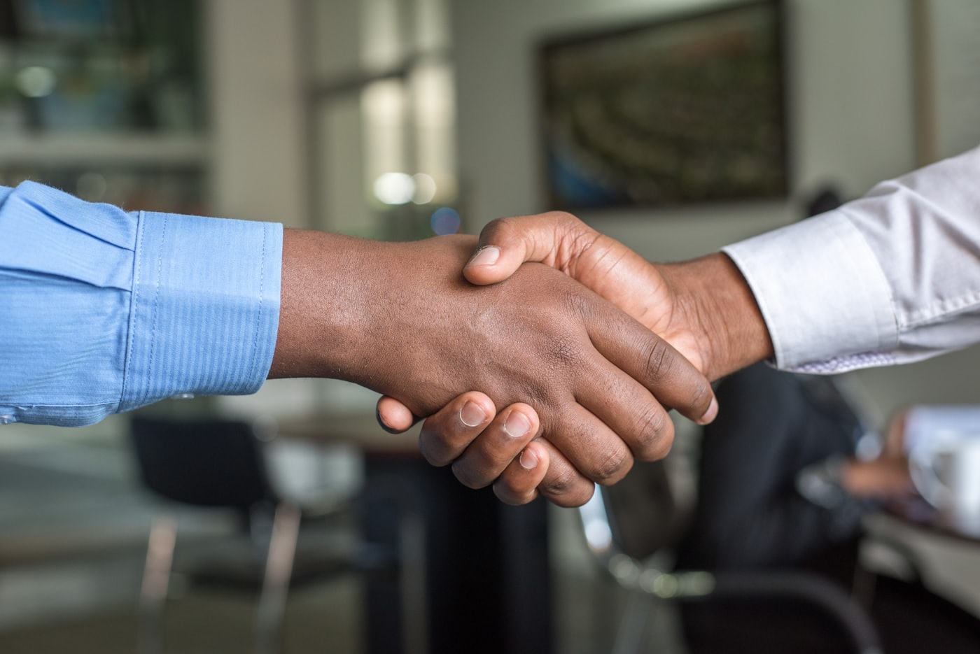 A handshake closing an agreement